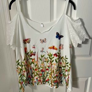 Sexy, cute butterfly cold shoulder top with  lace sleeves.